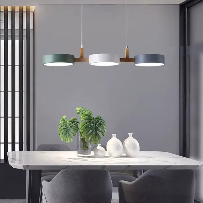 Lampe suspendue LED à trois têtes en forme de macaron