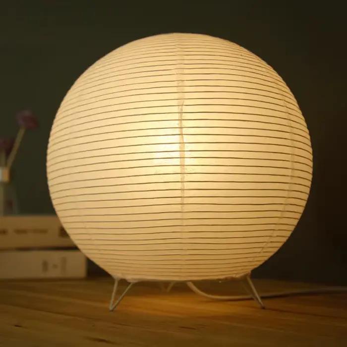 Lampe de table Xuan en papier LED pour salon chambre chevet étude hôtel avec abat-jour en papier blanc gris jaune noir et émission de lumière RVB bleu vert