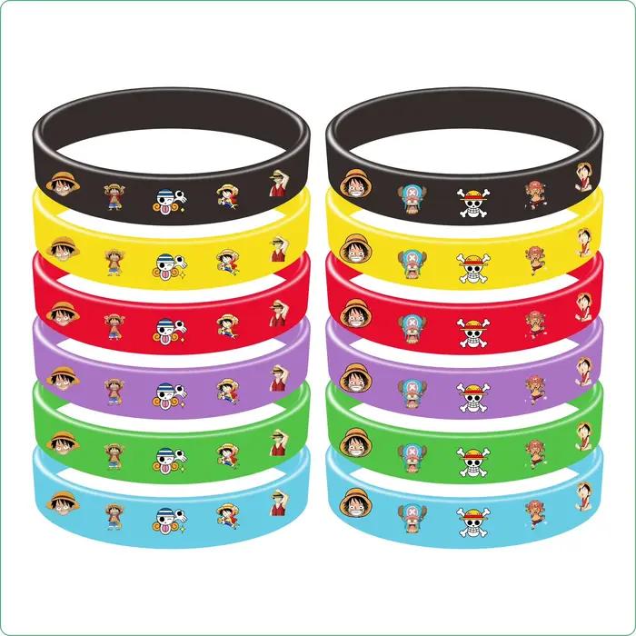 Articles de fête d'anniversaire One Piece : décorations, décorations de gâteau, remplisseurs de sacs cadeaux, bracelets slap, autocollants, récompenses pour la classe, et autres articles promotionnels