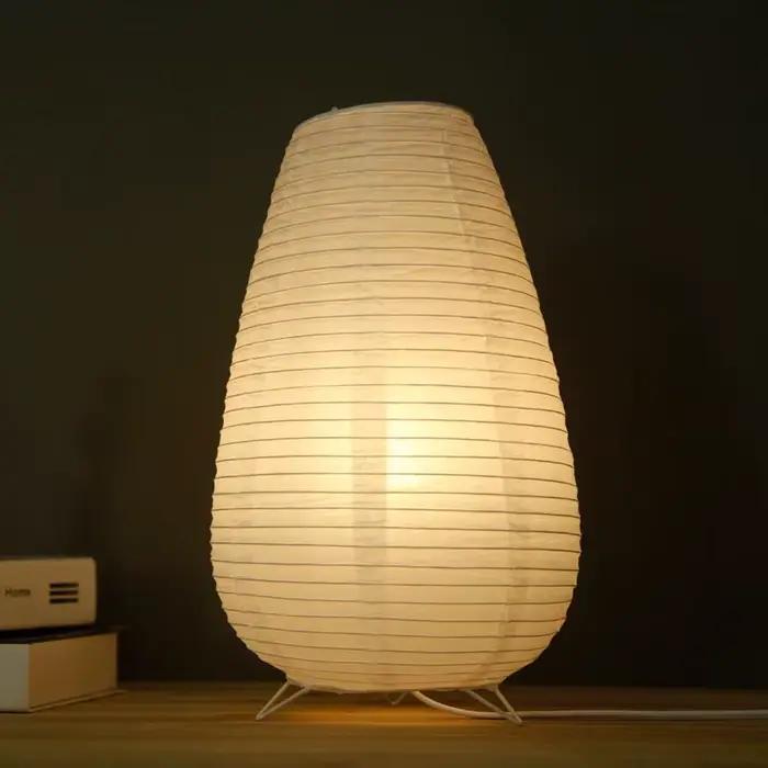Lampe de table Xuan en papier LED pour salon chambre chevet étude hôtel avec abat-jour en papier blanc gris jaune noir et émission de lumière RVB bleu vert